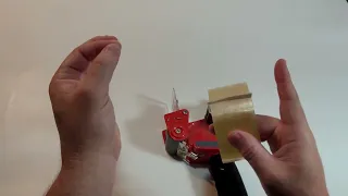 How to add a roll of tape to a tape dispenser