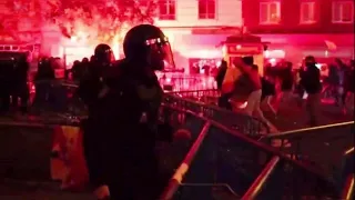 Chaos in Madrid: Thousands of protesters clash with police at Socialist Party HQ