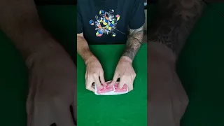 Spectator fooling card trick.