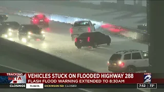 Vehicles stuck on flooded Highway 288