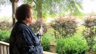 Gun-wielding grandmother holds suspect at gunpoint