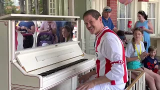DISNEY PIANIST NEAL AT CASEY'S CORNER IN MAGIC KINGDOM - BEST PIANO PLAYER EVER!