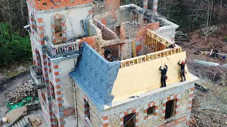 The roofing felt starts to go on, one step closer to watertight.