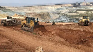 Caterpillar D9T Bulldozer Working With Caterpillar D9R And Komatsu D275AX Bulldozers