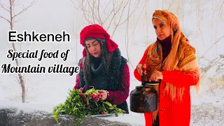 eshkenehspecial village food with lamb meat on a snowy day in a mountain village.(persian recipes)