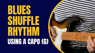 Try a capo playing this blues guitar shuffle rhythm (G)