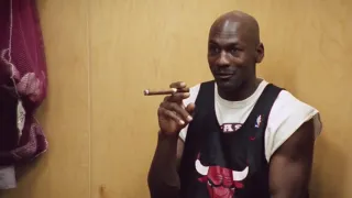 Michael Jordan talking trash with baseball bat and cigar