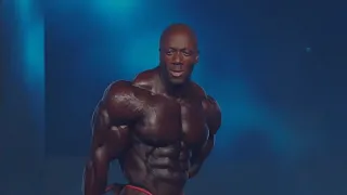 Shawn Rhoden Posing at 2018 Mr. Olympia Finals