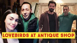 Özge yagiz and Gökberk demirci at antique shop