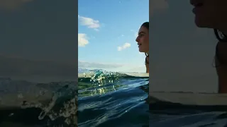 Byron Bay Surfer Girl Paddling at Wategos Beach Australia