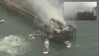 Fire crews contain massive fire that erupted on historic Oceanside Pier