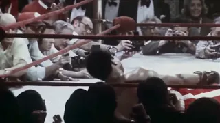 Joe Frazier knocks down Muhammad Ali for the first time in his career