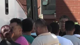 Migrants board charter buses to Chicago from El Paso, Texas