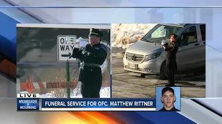 The gun salute and Taps at Matthew Rittner's funeral