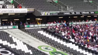 LEEDS FANS MOVING FROM HOME END TO AWAY END