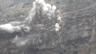 Rock blasting slow motion