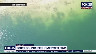 Body found in submerged car spotted by drone