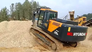 Excavator working in crusher area