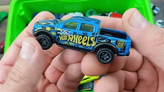 Hot Wheels cars and other cars of famous brands taken out of the box