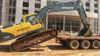 Excavator volvo 210 unloading