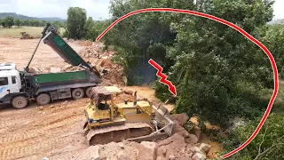 Part126 Experience Dozers D61EX Unloading Push Stone Clearing Wood and water Area