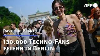 130.0000 Techno-Fans feiern in Berlin | AFP