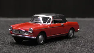 676. Peugeot 404 Cabriolet 1/34-39 - Welly Old Timer