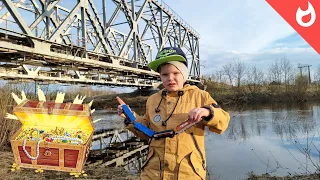 Freight trains on the railway bridge and the river flood / watching trains and building a railway