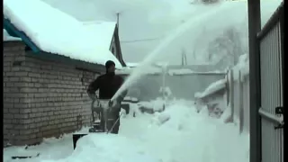 Работа снегоуборщика