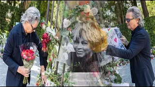 Erwin Bach is seen for first time since her death as he places a bouquet of red roses at a memorial