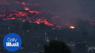 La Palma volcano: 100 homes said to be destroyed as lava spews