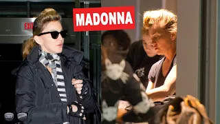 Madonna with her perfectly coiffed hair arrives at airport in NYC