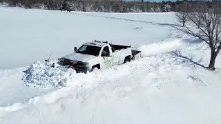 GOT THE TRUCK STUCK IN 4’ DRIFTS!  | WESTERN V PLOW DOING WHAT IT DOES BEST |