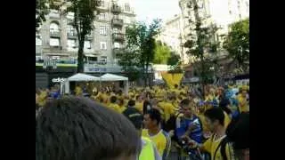 EURO 2012. Kiev. 11.06.12. Ukrainian fans walk past the Swedish fan zone.