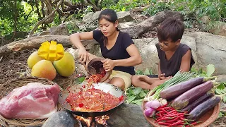 Ripe mango and Pork spicy braised with eggplant for food - Cooking and Eating delicious in jungle
