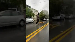 CRAZY HILL BOMBING IN THE RAIN! 🙉🛹  #shorts #skateboard