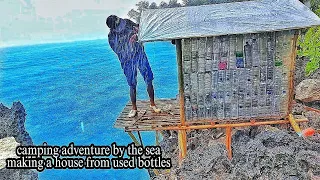 camping adventure for 2 days 2 nights in heavy rain making a shelter from used bottles