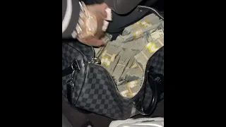 6ix9ine dares someone to pressed him with $1 Million of cash on him