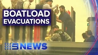 Victoria Fires: Stranded tourists, residents rescued by HMAS Choules | Nine News Australia