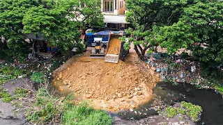 New Project Land Filling Up 5Ton Dump Truck Moving Dirt With Bulldozer Pushing Soil In The For Canal