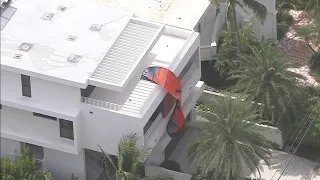 Kitesurfer dies after crashing into side of Hollywood home