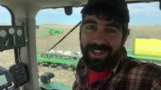 Up close with a farmer planting corn!