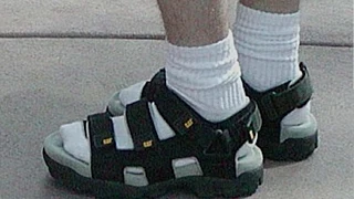 From 2002: Socks with sandals. Fashion faux pas?