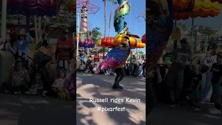 Russell from “Up” Rides Kevin in “Better Together: A Pixar Pals Celebration” at Pixar Fest 2024