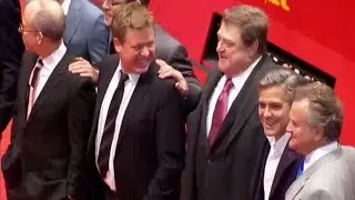 BERLINALE MONUMENTS MEN RED CARPET (George Clooney and his Monuments Men whip fans)