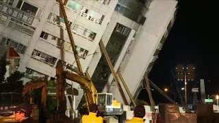 Rescuers scour tilting buildings after Taiwan quake kills six