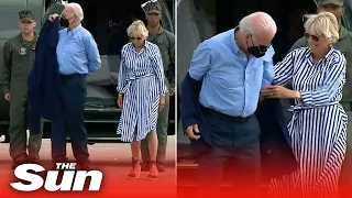 Awkward moment Joe Biden gets stuck in his jacket and has to ask Jill for help
