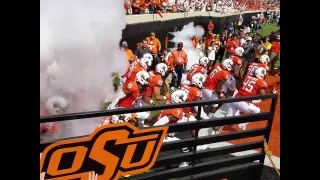 Oklahoma State Cowboys football team coming onto the field at Boone Pickens Stadium