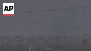 Air drops of aid supplies parachuted into Gaza Strip as Israel-Hamas war continues