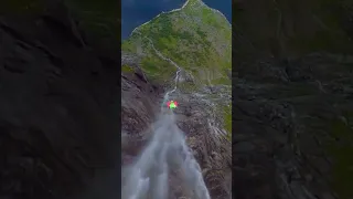 Wingsuit BASE-jumping over waterfalls in Norway #extremesports #worldtravel #norway